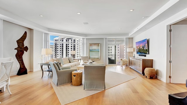 living room with light hardwood / wood-style floors