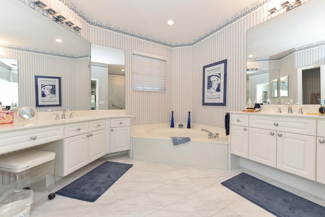 bathroom featuring vanity and a tub