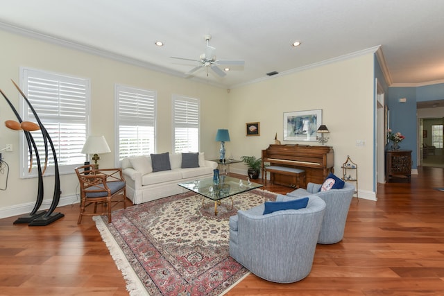 living room with ceiling fan, ornamental molding, and hardwood / wood-style floors