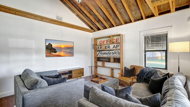 living room featuring dark hardwood / wood-style flooring and high vaulted ceiling