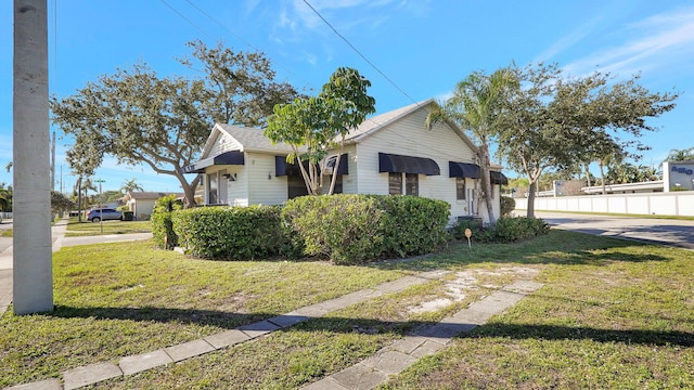 view of property exterior featuring a yard