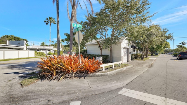 view of side of property featuring a garage