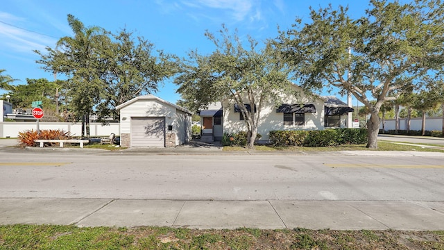 view of front of house featuring an outbuilding and a garage