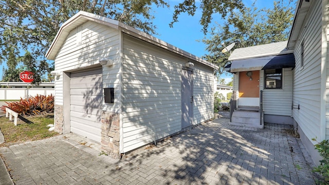 view of outdoor structure with a garage