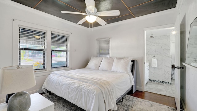 bedroom with ceiling fan, ornamental molding, dark hardwood / wood-style floors, and connected bathroom