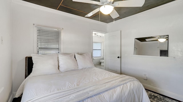 bedroom with ceiling fan and ensuite bathroom