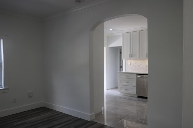 interior space with crown molding