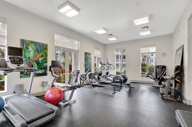 exercise room featuring french doors