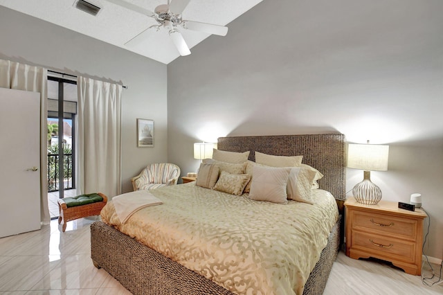 bedroom with ceiling fan, vaulted ceiling, and access to outside