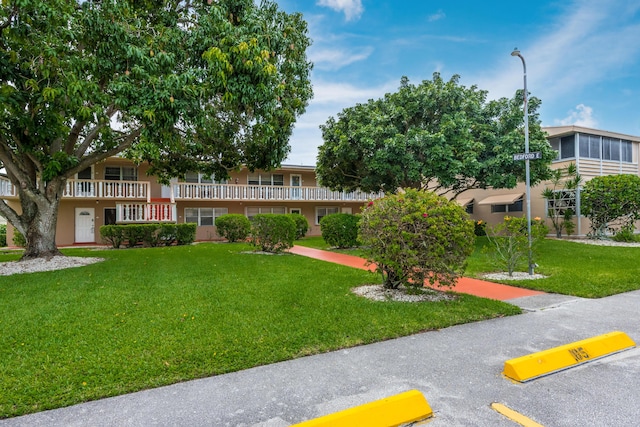 exterior space featuring a lawn