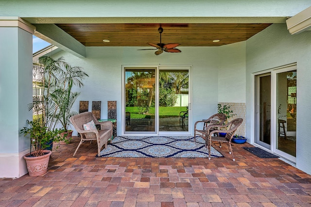 view of patio / terrace featuring ceiling fan