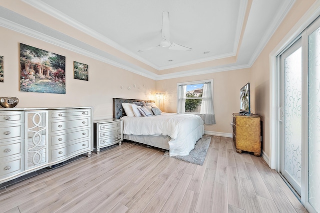 bedroom featuring ornamental molding, light hardwood / wood-style floors, and ceiling fan