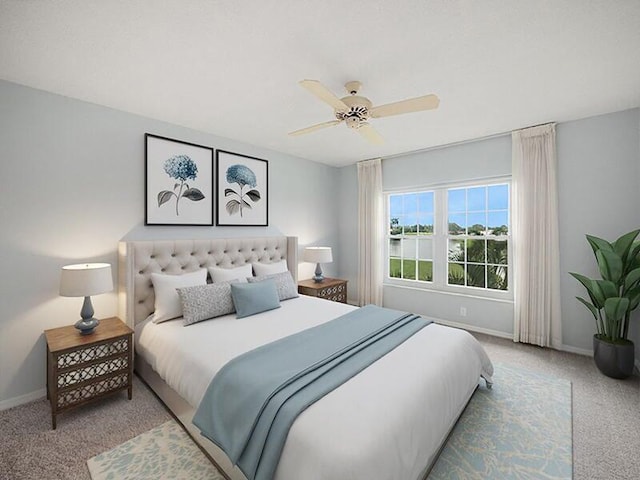 bedroom with light colored carpet and ceiling fan