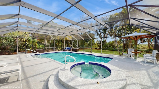 view of swimming pool featuring an in ground hot tub, a lanai, a patio area, and a lawn