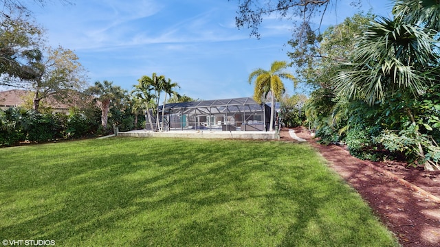 view of yard featuring a lanai