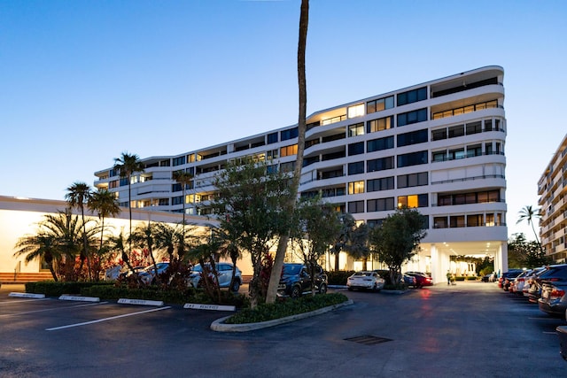 view of outdoor building at dusk