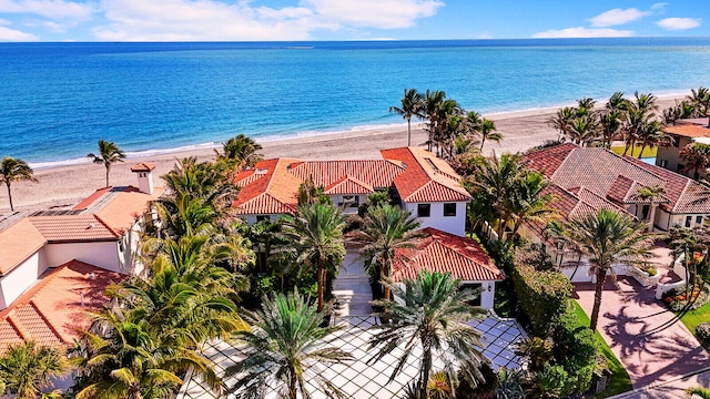 aerial view featuring a view of the beach and a water view