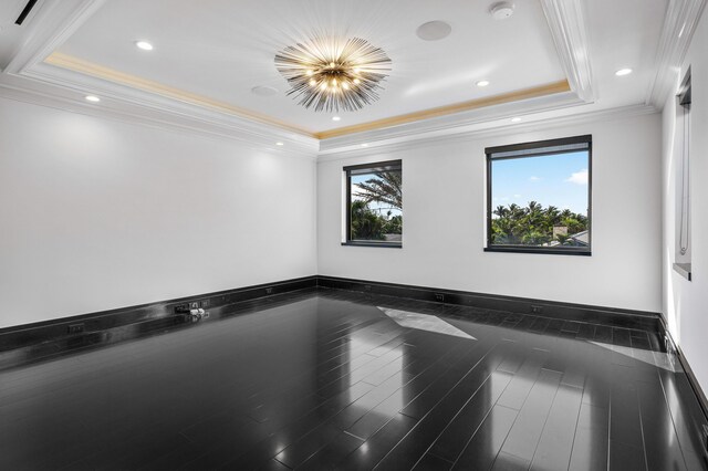 interior space with a chandelier, recessed lighting, dark wood-type flooring, vaulted ceiling, and ornamental molding