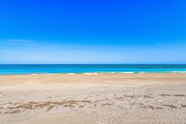 property view of water featuring a view of the beach