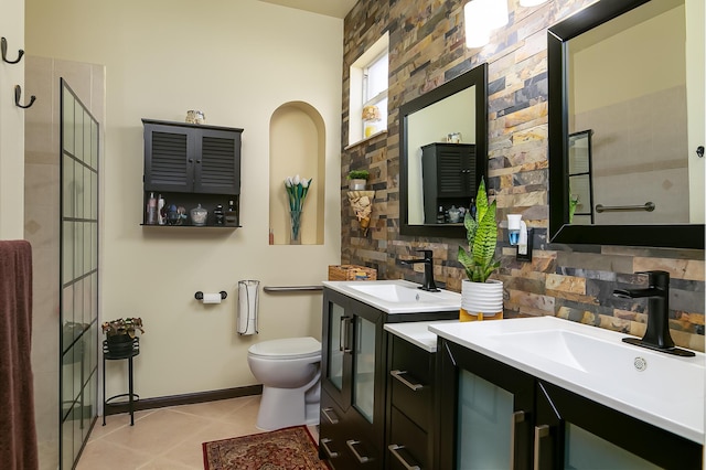 bathroom featuring tasteful backsplash, vanity, toilet, and tile patterned flooring