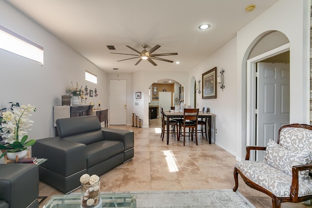 living room featuring ceiling fan