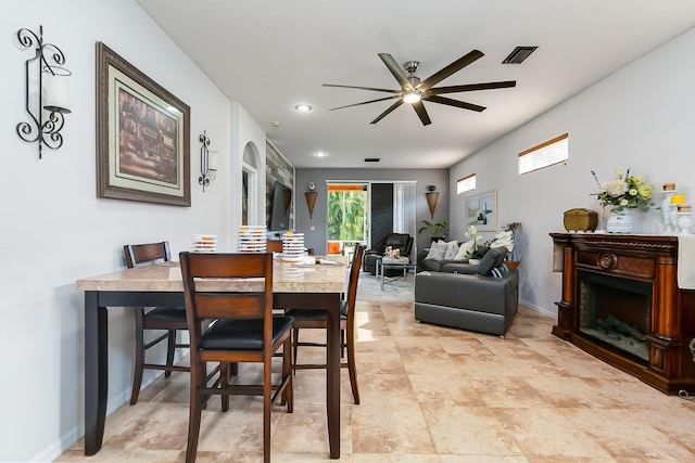 dining room with ceiling fan