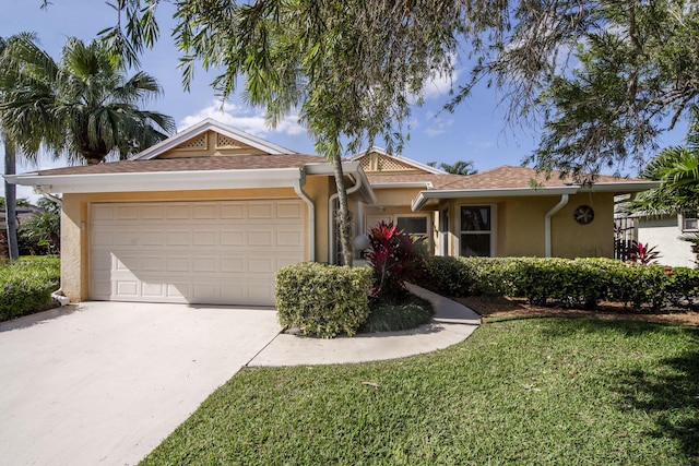 ranch-style house featuring a garage and a front lawn