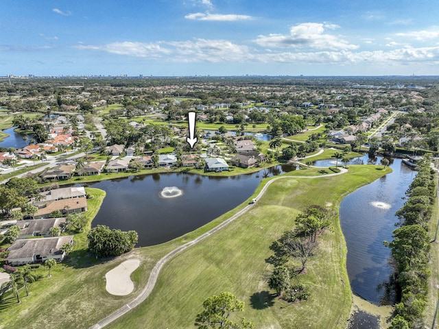 6938 Touchstone Cir, Palm Beach Gardens, FL 33418 - aerial view of property's location with nearby suburban area, a large body of water, and a local golf course
