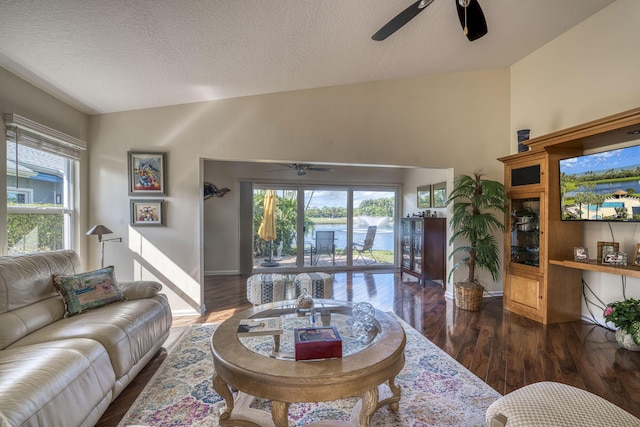 6938 Touchstone Cir, Palm Beach Gardens, FL 33418 - living area with a ceiling fan, wood finished floors, a textured ceiling, and baseboards