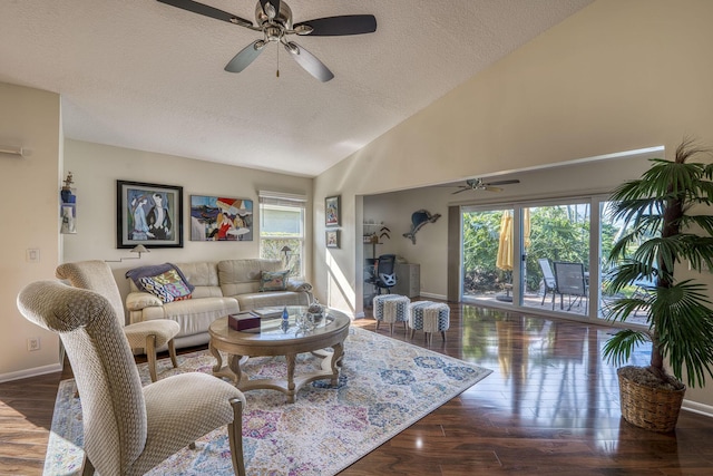 6938 Touchstone Cir, Palm Beach Gardens, FL 33418 - living area featuring a ceiling fan, a textured ceiling, baseboards, wood finished floors, and high vaulted ceiling