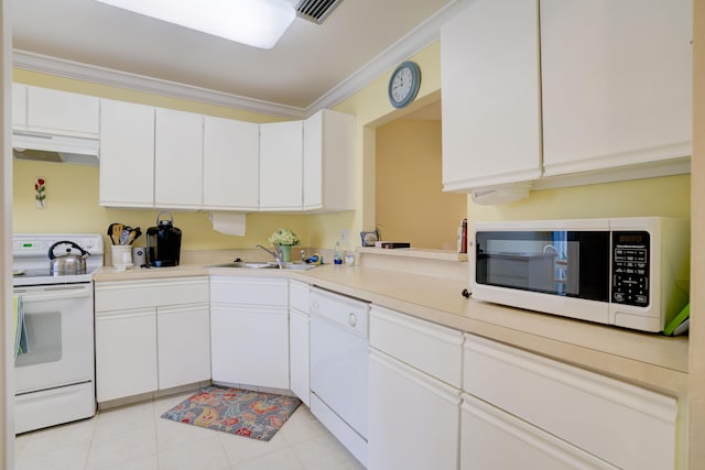 kitchen with light tile patterned flooring, sink, white cabinetry, crown molding, and white appliances