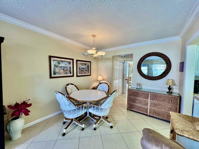 dining area with light tile patterned floors, crown molding, and a textured ceiling