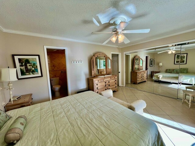 bathroom featuring tile walls, vanity, curtained shower, and toilet