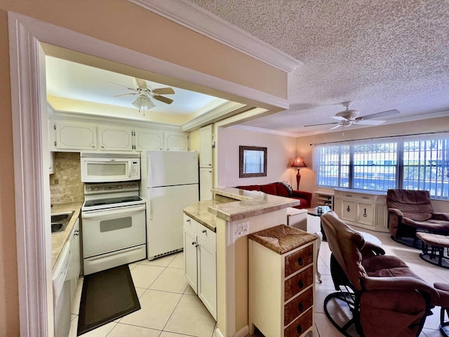 kitchen featuring ornamental molding, light tile patterned floors, white appliances, ceiling fan, and a textured ceiling