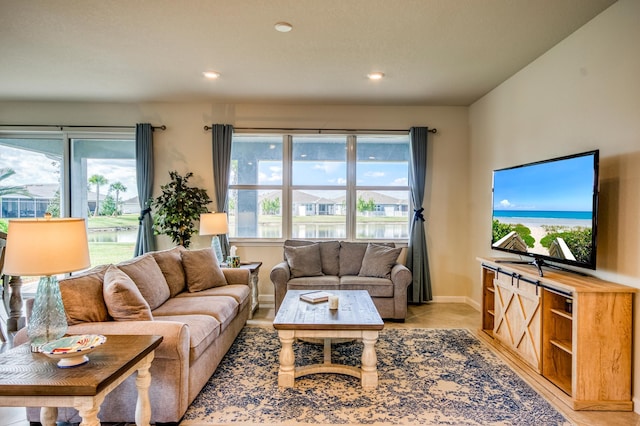 living room with light tile patterned floors