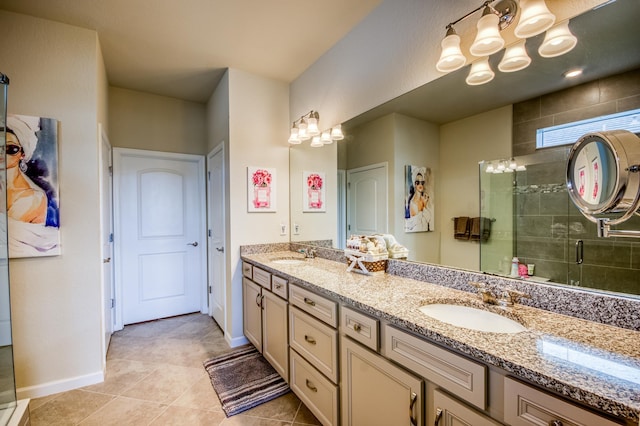 bathroom with vanity, tile patterned floors, and a shower with door