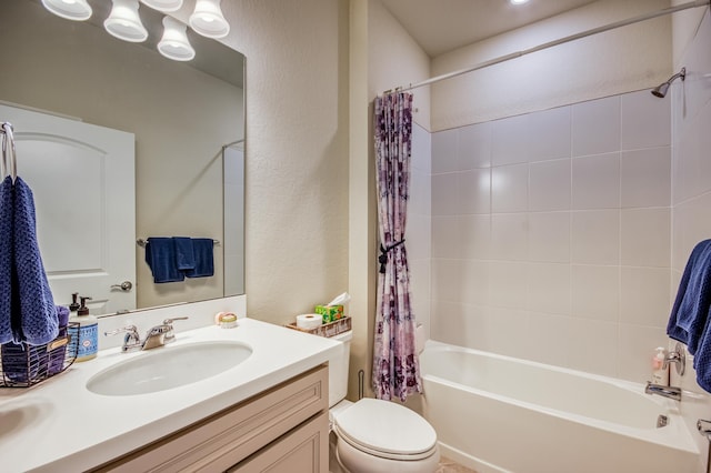 full bathroom with shower / bath combination with curtain, vanity, and toilet