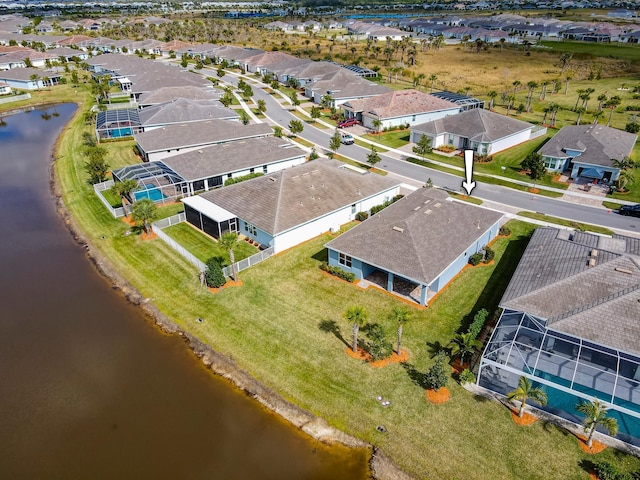 drone / aerial view with a water view