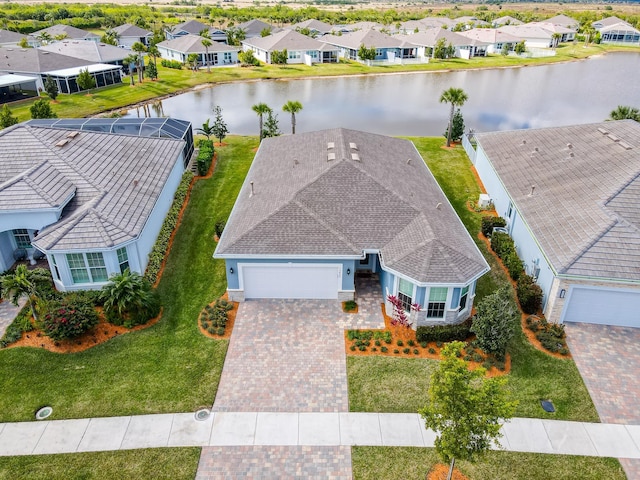 bird's eye view with a water view