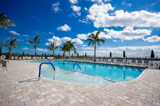 view of swimming pool featuring a patio