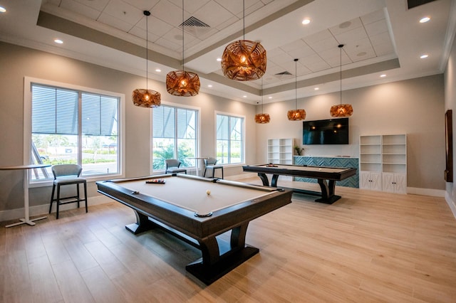 playroom with crown molding, billiards, a raised ceiling, and light wood-type flooring