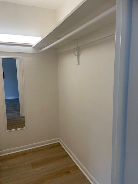 tiled empty room featuring a wealth of natural light