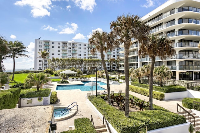 view of swimming pool featuring a patio