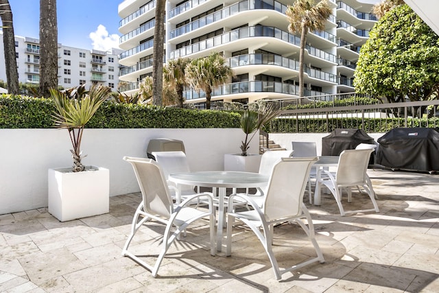 view of patio featuring a grill