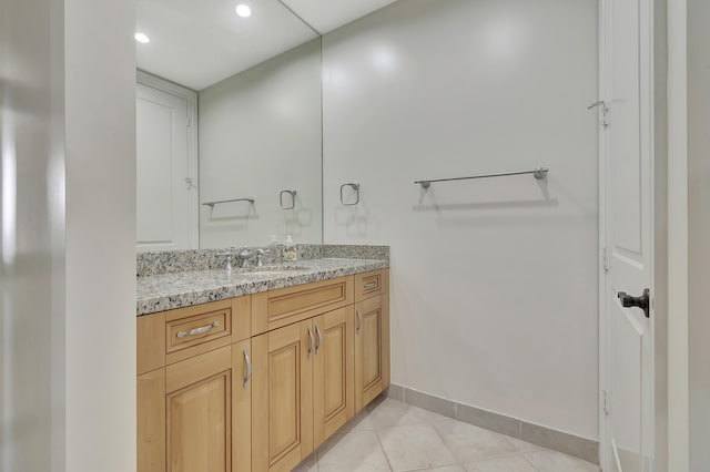 bathroom with vanity and tile patterned floors