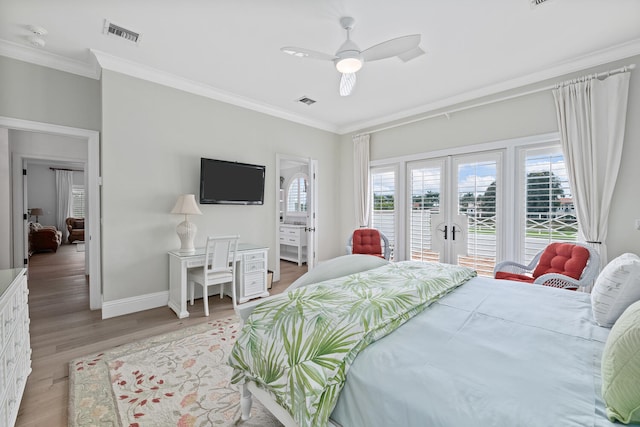 bedroom featuring crown molding, light hardwood / wood-style flooring, ceiling fan, access to exterior, and french doors