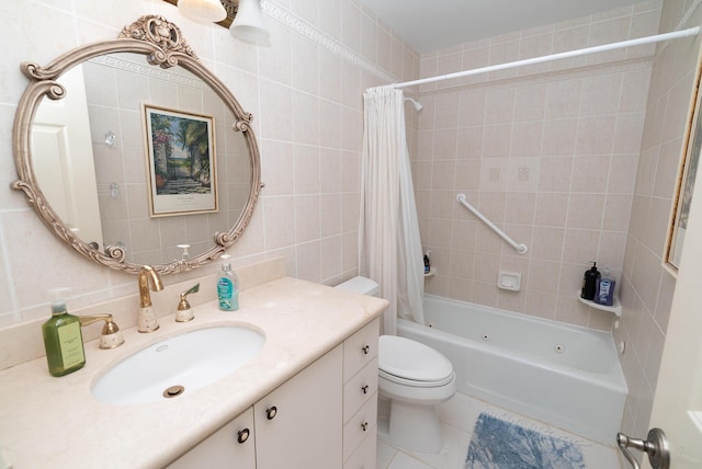 full bathroom with tile walls, tile patterned flooring, vanity, shower / bath combination with curtain, and toilet