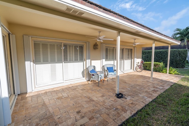 view of patio featuring ceiling fan