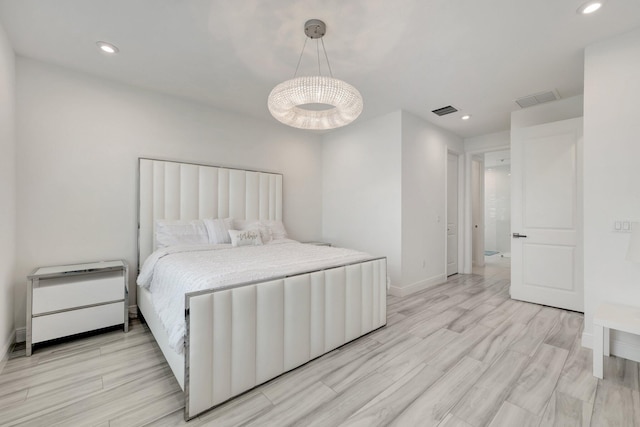 bedroom featuring light hardwood / wood-style flooring