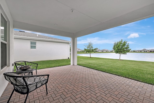 view of patio / terrace featuring a water view